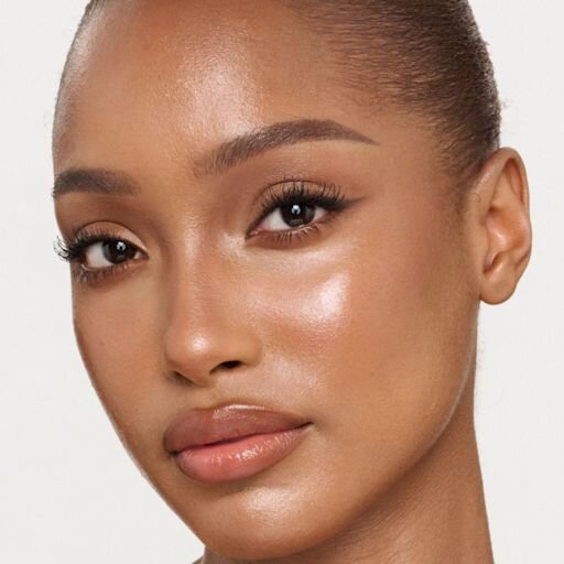 UNREAL SKIN SHEER GLOW TINT HYDRATING FOUNDATION STICK 10 TAN